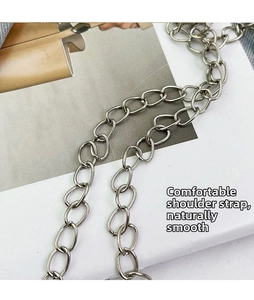 Polished silver metal chain strap detail with smooth oval links for women's crossbody bag