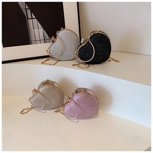 Glitter heart-shaped evening clutch bags in silver, black, gold and pink colors