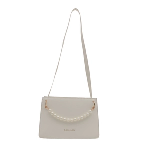 Minimalist white square handbag with decorative pearl handle and adjustable shoulder strap