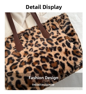 Close-up of leopard print faux fur tote with premium brown leather handle stitching