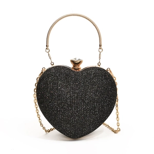 Black heart-shaped evening clutch bag with sequins, gold handle and chain strap