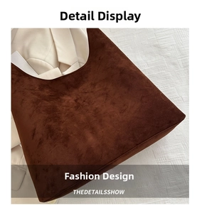 Detailed texture of dark brown suede shoulder bag with retro half-moon design and rich finish