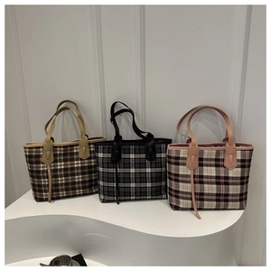 Three plaid tote bags in brown, black, and beige colors with stylish leather straps