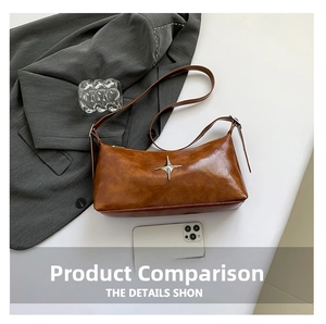 Detailed macro view of vintage brown oiled leather bag with silver star metal accent