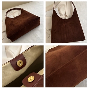 Detail view of coffee suede hobo bag showing magnetic closure and premium texture