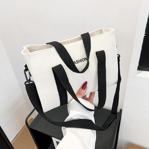 Fashion canvas tote bag with black straps and letter print for casual shoulder wear