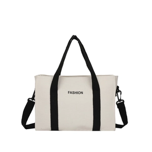 Sac cabas en toile blanche minimaliste avec lettrage FASHION et bandoulière noire réglable