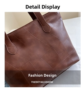 Detail of dark brown tote bag featuring unique geometric leather patchwork and fine stitching