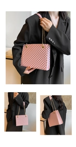 Detailed views of pink monogram tote bag with chain strap on a black blazer outfit