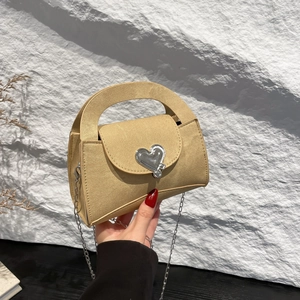 Minimalist heart-accented square handbag in light brown canvas with silver chain strap
