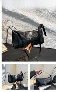 Detail view of black Y2K shoulder bag with silver star accent and smooth glossy finish