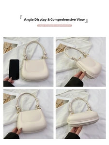 Detailed views of the cream saddle handbag with knot handles and size comparison to phone