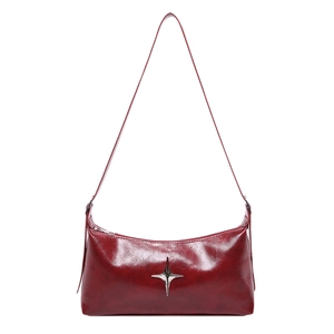 Sleek burgundy faux leather shoulder bag with glossy oil-wax finish and silver star detail