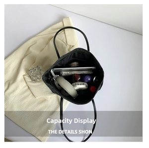 Spacious interior of the black polka dot tote bag showing storage for daily essentials
