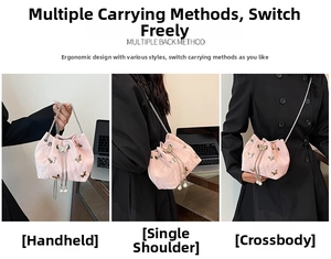 Detailed view of the butterfly bucket bag showing handheld, shoulder, and crossbody styles