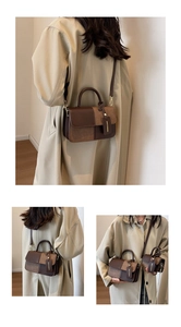 Detail of a color-block crossbody bag with brown leather and khaki suede texture