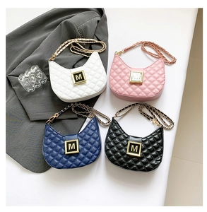 Detailed view of quilted moon bags in four colors with gold M buckle and chain strap