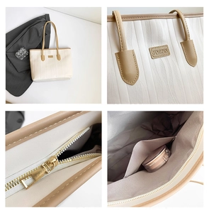 Macro details of large tote bag with Jingpin logo, golden zipper and spacious interior