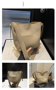 Detail of khaki bucket bag in pebble leather with wide strap shown from multiple angles