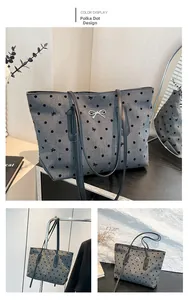 Detailed views of grey canvas tote bag with black polka dots and silver bow charm