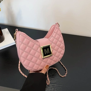 Pink quilted crossbody bag with gold chain strap and stylish square M buckle closure