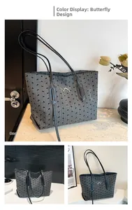 Close-up of canvas tote bag with polka dot bow print and 3D silver bow detail