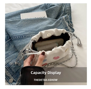 Top view of white corduroy bucket bag showing storage capacity for phone and wallet