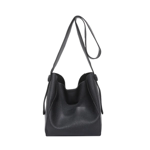 Chic black litchi pattern leather bucket bag with retro soft texture and shoulder strap