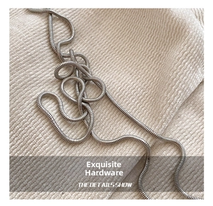 Detail of high-quality polished silver metal snake chain for luxury shoulder bags