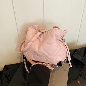 Pink heart quilted shoulder bag with silver chain strap and leather handle