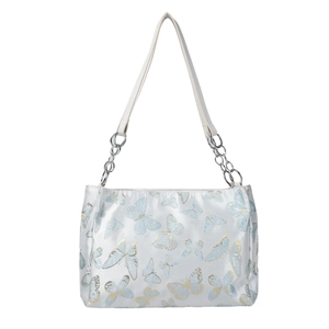 Elegant white embroidered underarm bag featuring light blue butterfly patterns and gold edges