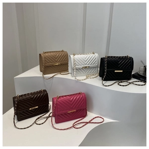 Five elegant quilted chain bags in khaki, white, black, coffee and rose red displayed on steps