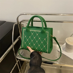 Chic green quilted shoulder bag with heart embroidery and detachable strap for women