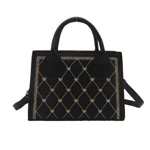 Retro black leather underarm bag with heart embroidery and quilted square design