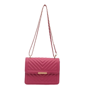 Magenta chevron quilted crossbody bag with gold chain strap on white background