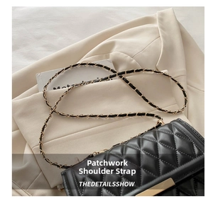 Detail of crossbody bag showing the elegant metal chain and leather spliced shoulder strap