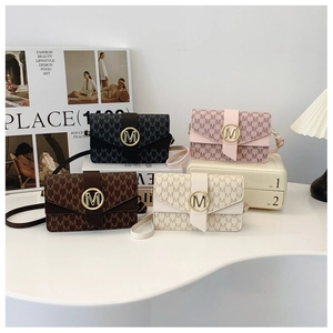 Chic women's monogram crossbody bags in four colors with gold M-logo buckles