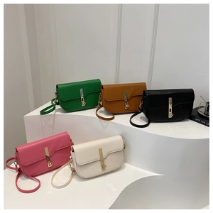 Minimalist leather saddle bags for women in green, brown, black, pink, and white options