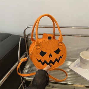 Fashionable pumpkin-shaped orange crossbody bag with a Halloween face design for women
