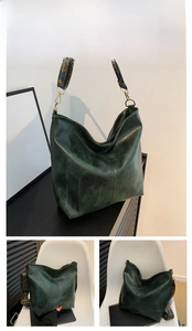Detail of vintage green hobo bag with ethnic style patterned wide shoulder strap