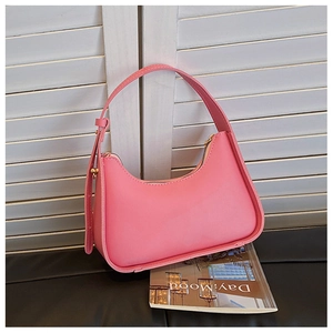 Detail of pink PU leather hobo bag with adjustable strap and golden metal buckle