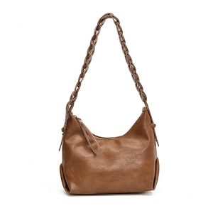 Vintage brown leather underarm bag with unique thick woven shoulder strap and zipper