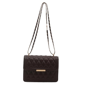 Dark brown quilted crossbody bag with gold hardware and chain strap on white background