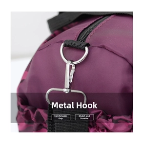 Close-up of the durable camouflage fabric and high-quality metal swivel hook on the travel bag