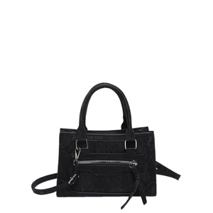 Minimalist black motorcycle crossbody bag with vintage texture and fringe details