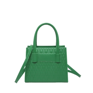 Quilted lime green tote bag with embossed leaf pattern and adjustable crossbody strap