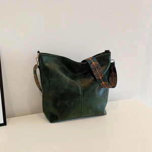 Retro dark green large tote bag in oil wax leather with colorful ethnic shoulder strap