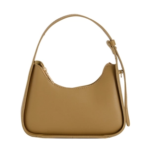 Minimalist crescent underarm bag in warm camel synthetic leather with adjustable strap