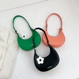 Three minimalist PU leather crescent hobo bags in green, pink, and black with flower charms