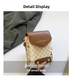 Detailed macro view showing the brown monogram canvas and leather flap with gold stud
